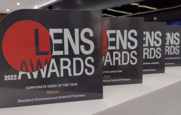 Several Lens awards trophies
